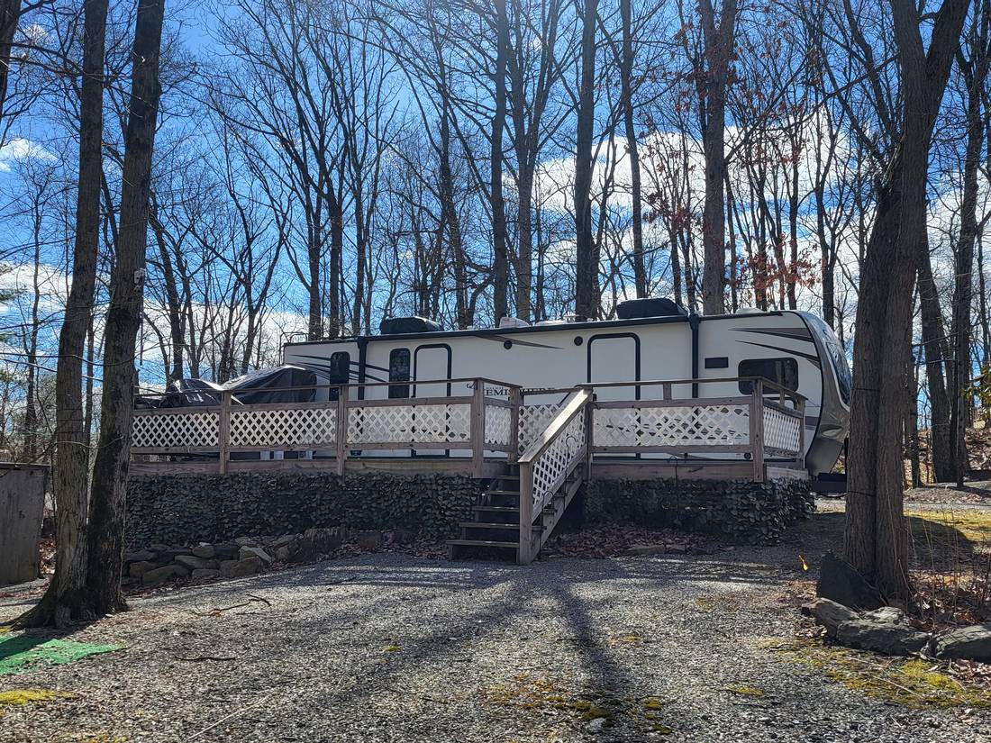 Seasonal RV site with wooden deck